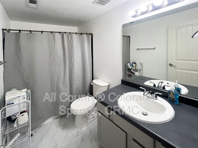 Building Photo - 6168 Rocking Chair Ln
