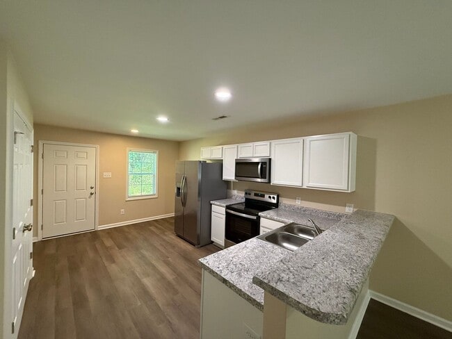 Building Photo - Nice 2 bedroom, 2 bath duplex. No pets allowed.