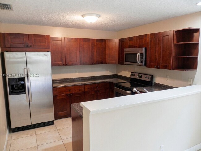 Foto del edificio - 10731 NW 16th Ct