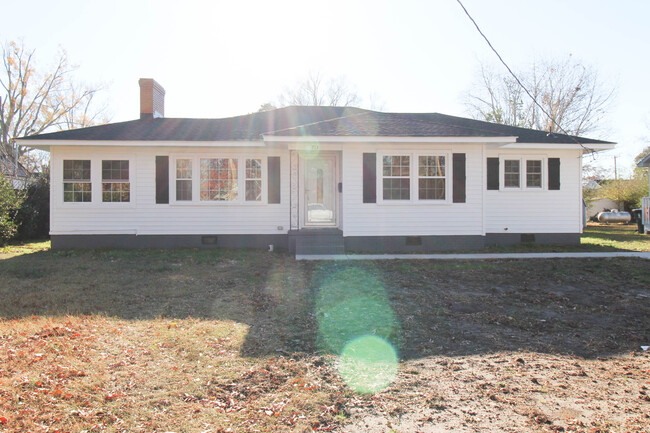 Front view with driveway and sidewalk - 713 Pennsylvania Ave