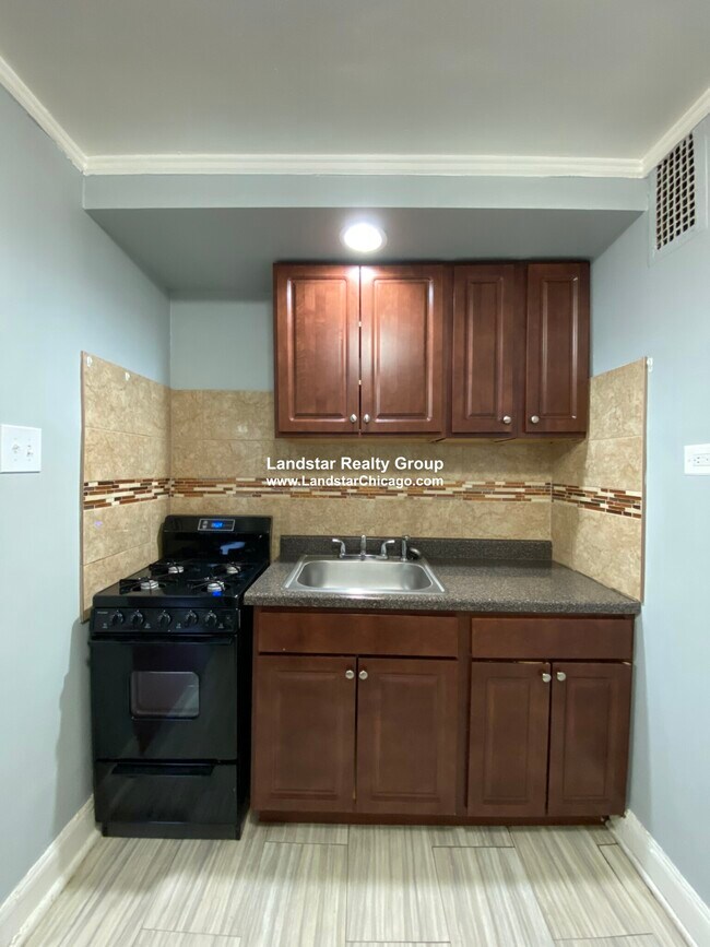 Foto del edificio - 6930 N Greenview Ave