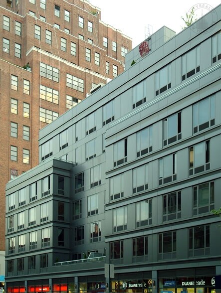 Building Photo - 127-131 8th Ave
