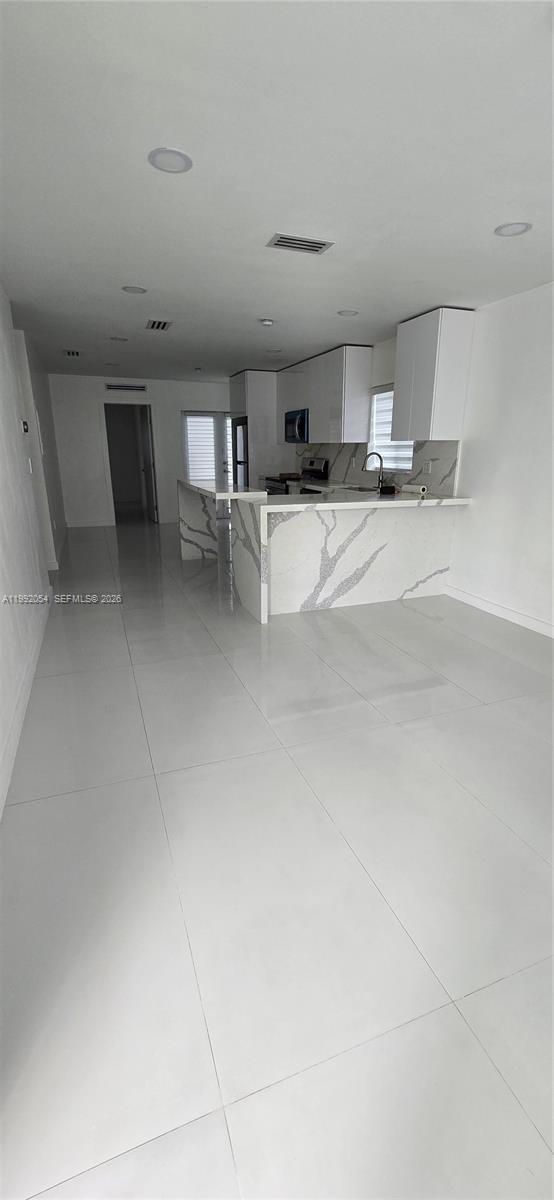 Foto del edificio - 1284 W 38th Pl