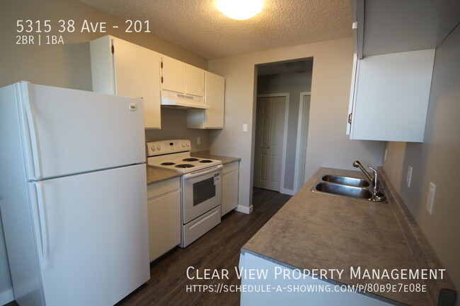 Photo du bâtiment - 2Bed/1Bath Beautiful Suite Taber Manor Com...