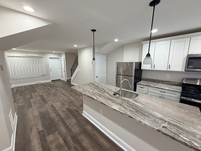 Kitchen, dining, and living room - 607 Cheraton rd