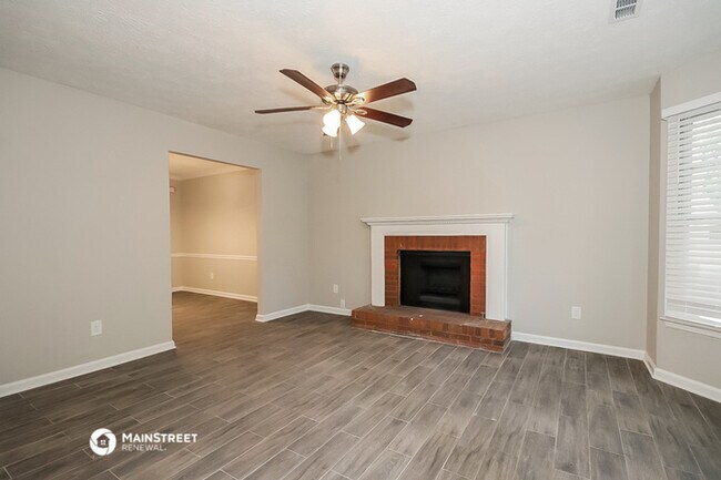 Building Photo - 6725 Songwood Dr