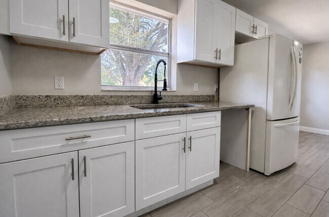 Building Photo - Beautifully Remodeled Lakefront Home – Move-In Ready!