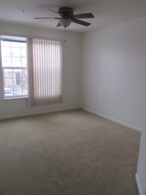 Building Photo - NEW CARPET NEW PAINT!! Clean and Bright 2BR 2BTH Condo Close To DIA. Gated Community in First Cre...