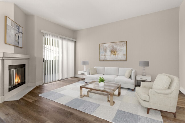 Gather around the fireplace and make every night cozy in your spacious living room. - Element