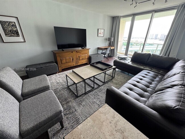 Building Photo - 19380 Collins Ave