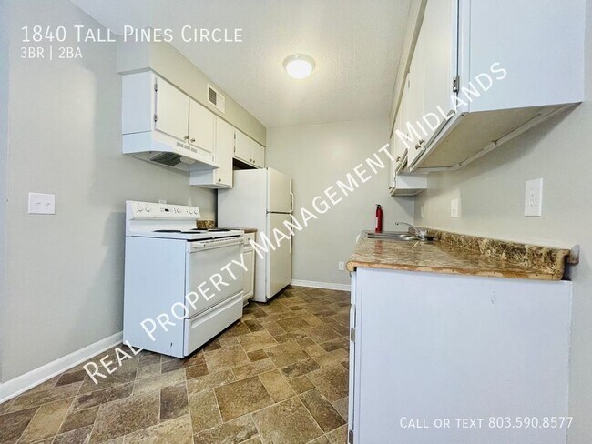Foto del edificio - Enjoy this Cozy Town House in the Tall Pin...
