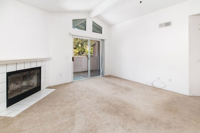 Building Photo - Upstairs, end unit 2 bedroom condo.