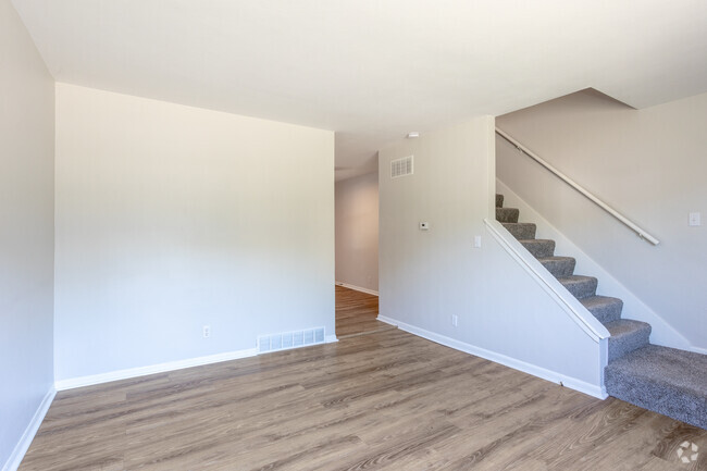 2BR, 1.5BA - Townhouse - Living Room - The Row at 35th Apartments