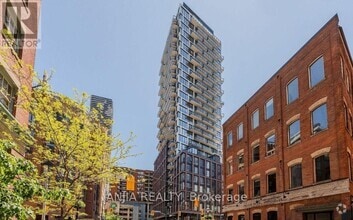 Building Photo - 2A-112A Church St
