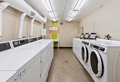 Coinless laundry on the same floor just down the hall - 3150 N Sheffield Ave