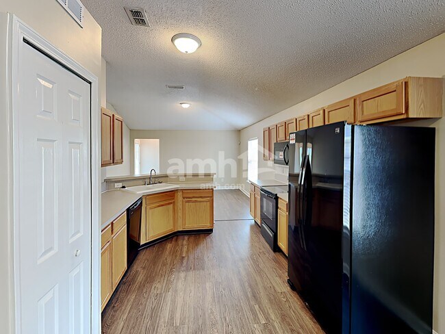 Foto del edificio - 6076 Scenic Meadow Ln