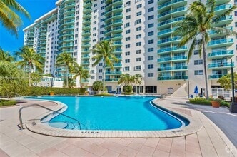 Building Photo - 19390 Collins Ave