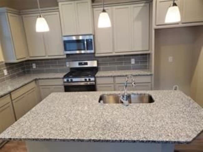 Kitchen Area has Stone Counter Tops - 2522 Manor Valley Ct