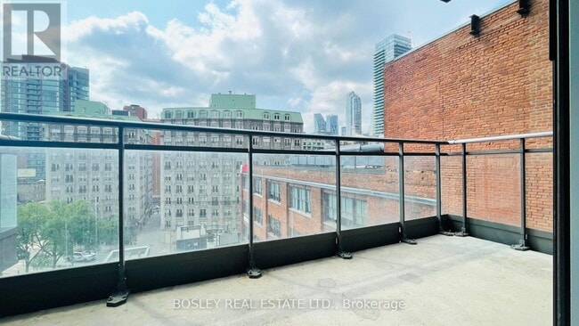 Building Photo - 127-127 Queen St E