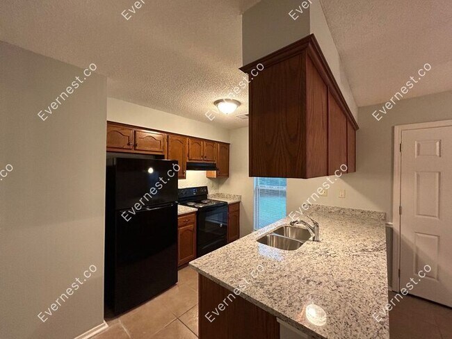 Foto del edificio - 6572 Rosewood Dr