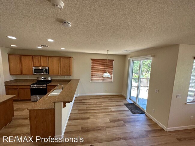 Building Photo - 4 br, 2.5 bath House - 6969 Jermann Court