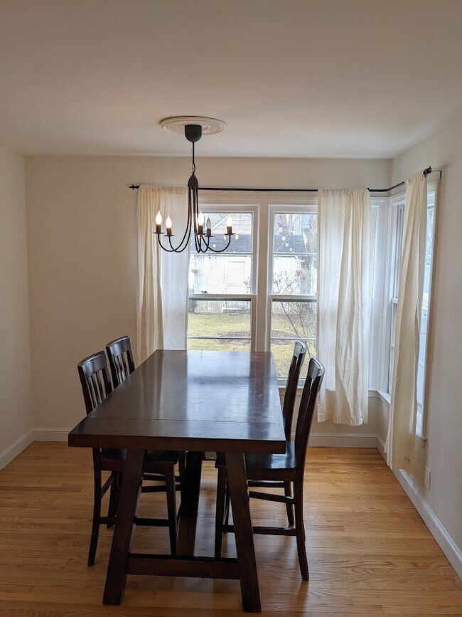 Light filled dining area with large windows overlooking the private backyard - 166 Arundel Ave