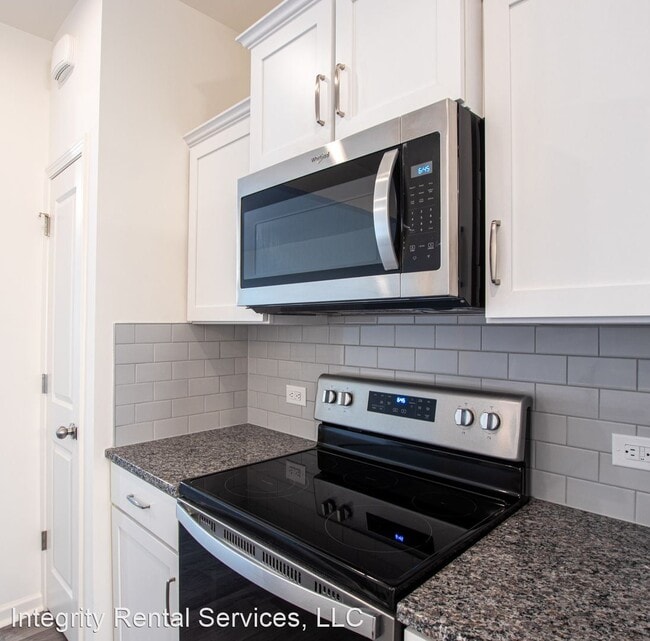 Building Photo - 2 br, 2.5 bath House - 3916 Wagon Way