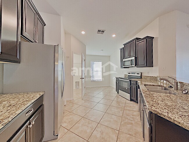 Foto del edificio - 13309 Wellington Hills Dr