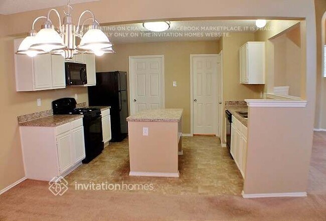 Foto del edificio - 5210 Wyndham Ct