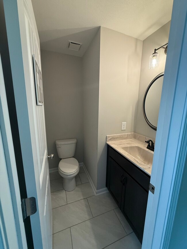Downstairs half bathroom - 1110 Stonebrook Dr