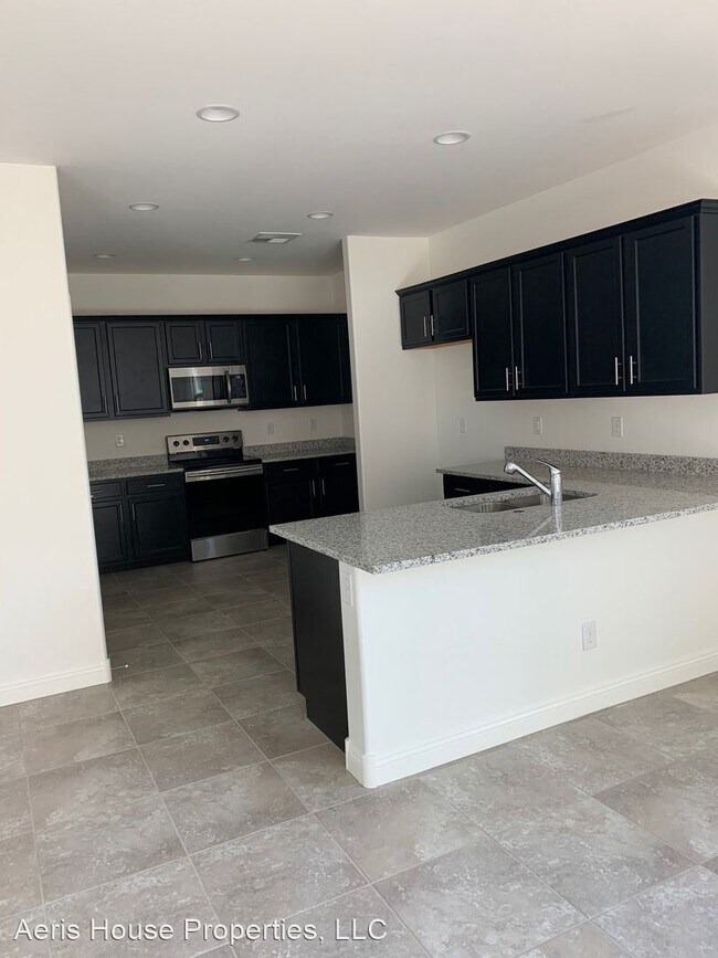 Building Photo - 4 br, 3 bath House - 6846 E Butte St