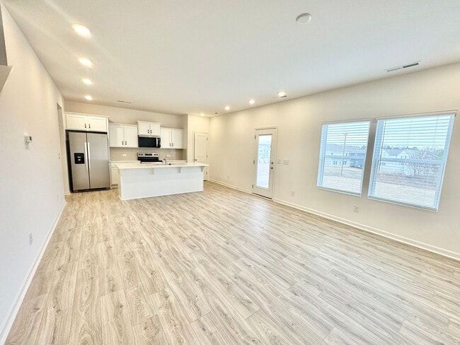 Building Photo - New 3 br home with loft area and 2 car garage