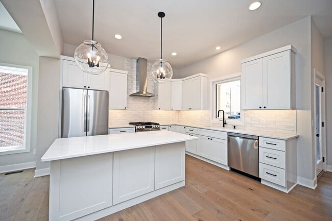 Building Photo - Stylish, Sustainable & Low-Maintenance Liv...