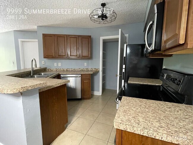 Building Photo - 9999 Summerbreeze Dr