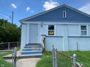 Building Photo - 318 N Sherman Dr