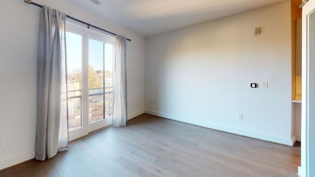 Photo - Updated Junior One Bedroom W/Full Sized Washer/Dryer, Large Bathroom, Spacious Kitchen, & More! Apartment