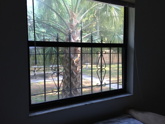View of the back yard from the window of the master bedroom. - 1101 SW 20th Place