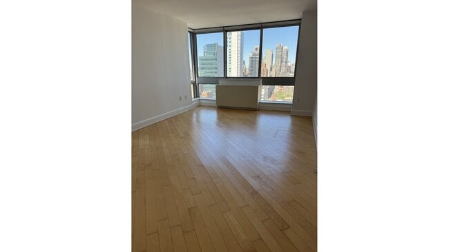 Photo - 231-235 E 55th St Apartment