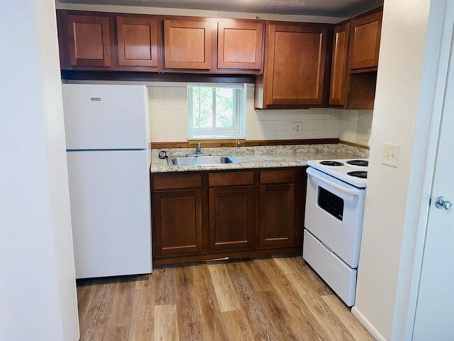 Building Photo - The Acadian Apartments