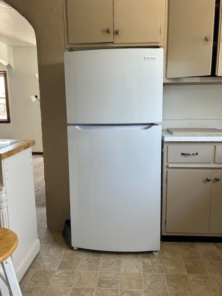 Kitchen includes dishwasher, fridge, microwave, stove, garbage disposal. - 101B N Mill St