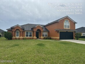 Building Photo - 10375 Woodley Creek Blvd