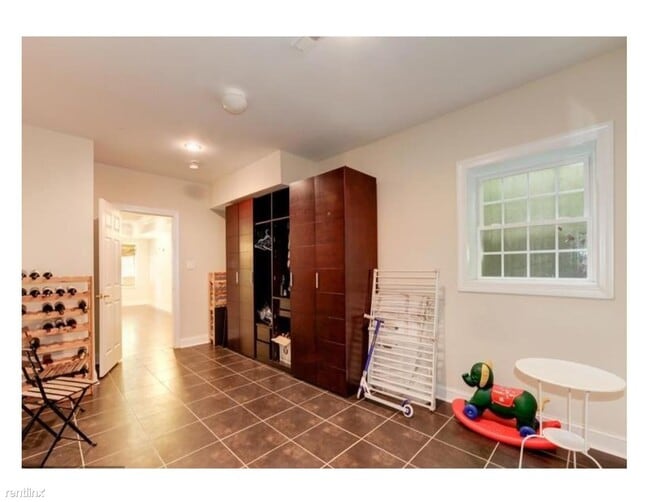 Building Photo - 6 br, 4.5 bath House - 6409 Macarthur Blvd.