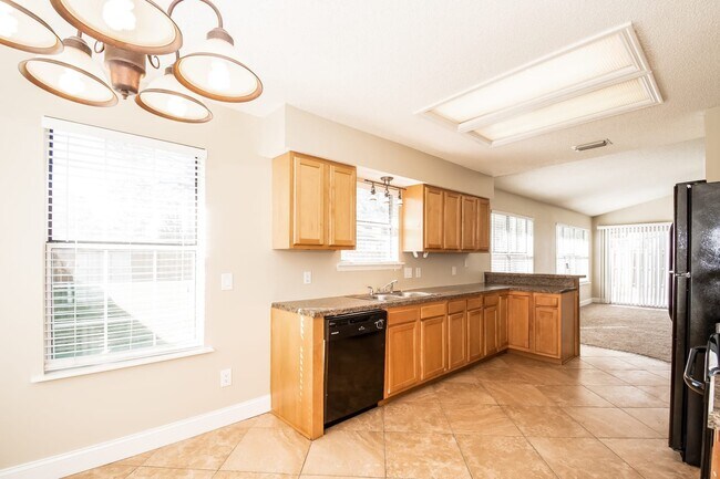 Building Photo - 7850 Collins Ridge Blvd E