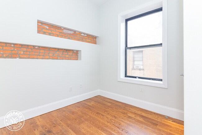 Building Photo - 16-55-55 Putnam Ave