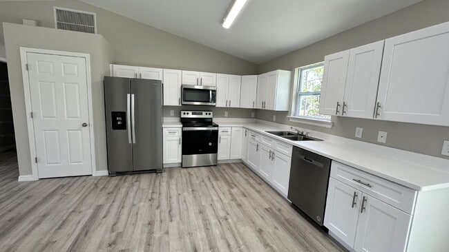 Photo - ***COMING SOON*** Beautiful 4BR/2BA 2 car garage home. Home is currently being enjoyed by another...