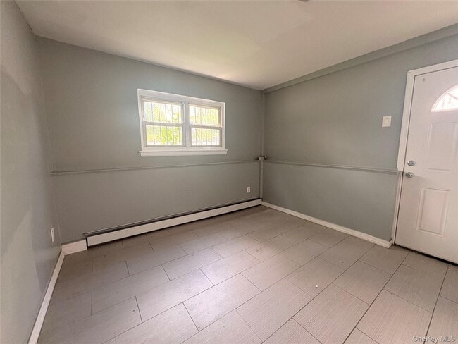 Building Photo - 69-47 De Costa Ave