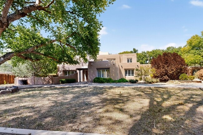 shaded by cottonwoods and other large shade trees - 1115 Roadrunner Ln NW