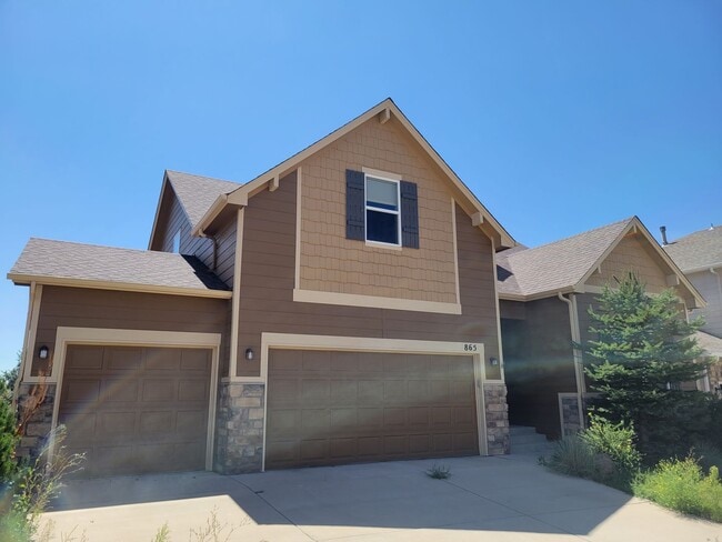 Photo - 4 Bed 3 Bath home with A/C and a gas fireplace, Available 5/8! - MileStone Real Estate Services
