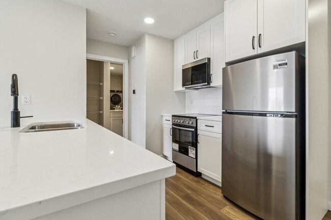 Building Photo - 21003-21025 25 Ave NW