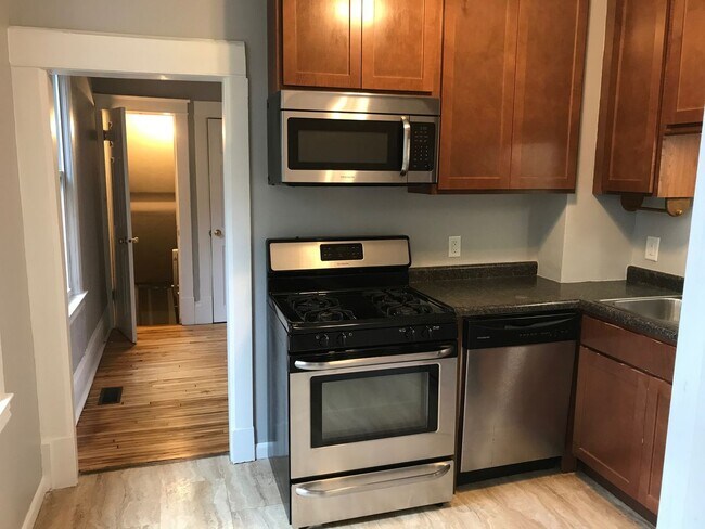 Building Photo - REDUCED!! Large 4 bed 2 full bath house in...